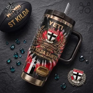 St Kilda Saints 153rd Anniversary YETI Stanley Tumbler with team logo, 1873-2026 dates, and black handle on dark background.