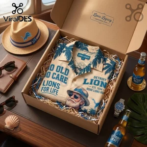 Detroit Lions Tropical Pattern Hawaiian Shirt inside a gift box with a fedora, sunglasses, and bottled beverages.