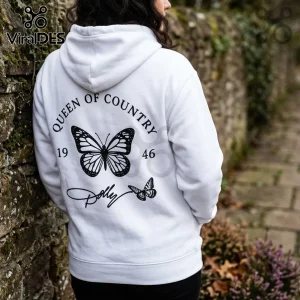 Dolly Parton Signature Tribute Pullover Hoodie in white with black butterfly graphics and Queen of Country text on the back.