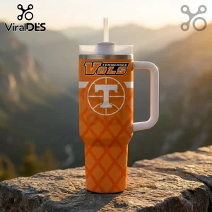 Tennessee Volunteers Basketball Orange Stanley Tumbler featuring a white T logo and net pattern on a mountain ledge.