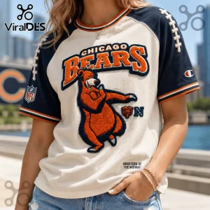 Chicago Bears Monsters of the Midway embroidered shirt featuring a cartoon bear, navy sleeves, and white base fabric.