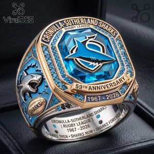 Cronulla-Sutherland Sharks 59th Anniversary ring featuring a blue gemstone, gold accents, and a shark logo relief design.