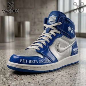 Phi Beta Sigma 1914 Air Jordan 1 Hightop Sneakers in royal blue and silver with greek lettering and a white rubber sole.