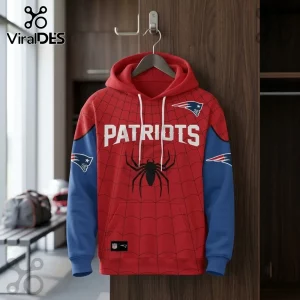 New England Patriots x Spider-Man Brand New Day Hoodie featuring red spiderweb pattern, team logos, and blue sleeves.