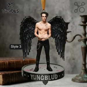 Yungblud Limited Edition 2026 Christmas Ornament featuring the artist with black wings on a circular stand.