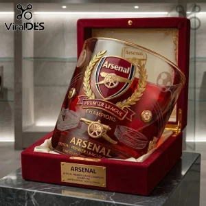 Arsenal FC Premier League Champions 2026 Whiskey Glass with gold crest engraving inside a red velvet lined display box.