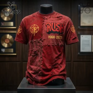 Rush 1968-2027 Distressed Red T-Shirt featuring a vintage aesthetic, central logo, and starman graphic on a mannequin.