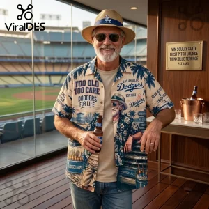 MLB Los Angeles Dodgers Palm Tree Hawaiian Shirt featuring blue graphics, text, and baseball stadium imagery on a man.