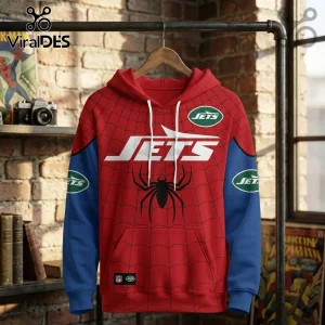 New York Jets x Spider-Man Brand New Day hoodie featuring red spiderweb pattern, blue sleeves, and Jets team logos.