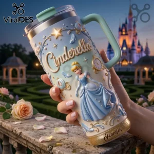 Cinderella Princess Stanley Tumbler 40oz featuring a blue gown illustration, clock motif, and gold glitter base.