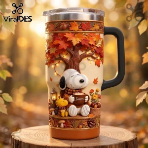Snoopy Personalized Autumn Leaves Tumbler features Snoopy and Woodstock under an orange fall tree with custom name text.