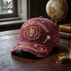Big Leo Energy Embroidered Maroon Distressed Baseball Cap featuring a lion face, sun symbol, and Born Leader text.