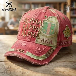 Alpha Kappa Alpha Pink Distressed Baseball Cap with embroidered gold lettering, green accents, and vintage 1908 patches.