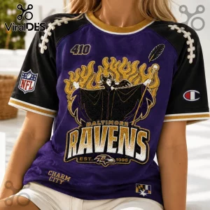 Maleficent x Baltimore Ravens embroidered purple shirt featuring NFL logo, football lace shoulder details, and Charm City text.