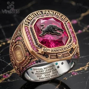 Penrith Panthers 60th Anniversary Gold Ring featuring a large red center stone, black panther emblem, and gold detailing.