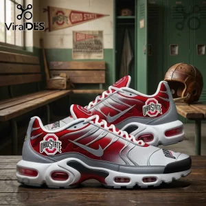 Ohio State Buckeyes Red and Silver Air Max Plus Sneakers featuring team logos on a wooden bench in a sports locker room.