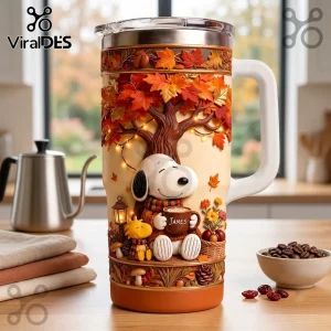Snoopy Personalized Autumn Leaves Tumbler featuring Snoopy and Woodstock under a fall tree with orange and red foliage.