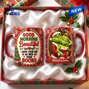 Personalized Grinch Couple Christmas Coffee Mug set with holiday graphics in a gift box on white satin fabric.