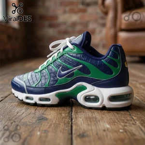 New Zealand Warriors Air Max Plus running shoes in blue, green, and white with a textured finish on wooden flooring.