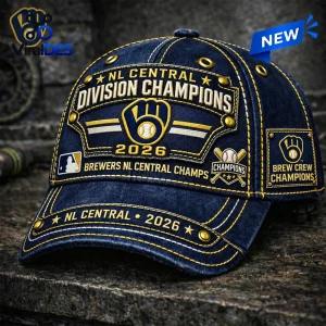 Front view of a dark blue baseball cap featuring Milwaukee Brewers 2026 Division Champions embroidery and gold accents.