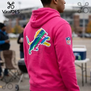 Detroit Lions NFL Crucial Catch pink pullover hoodie with team logo on back and NFL shield patch on sleeve.