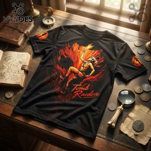 Tomb Raider 30th Anniversary Lara Croft T-Shirt featuring Lara holding a flare against a backdrop of stylized orange flames.
