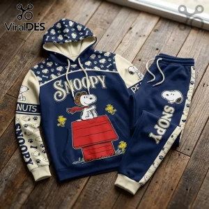 Snoopy Flying Ace Navy Blue Hoodie Jogger set featuring Snoopy on a red doghouse with Woodstock on a dark blue background.