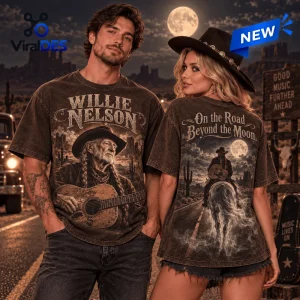 Front and back views of charcoal t-shirts featuring Willie Nelson graphics and On the Road Moonlit text.