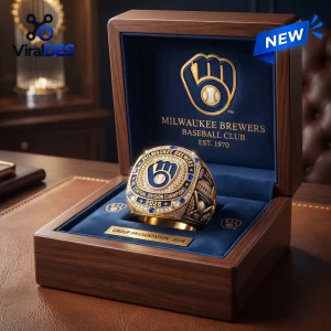 Close-up of a Milwaukee Brewers 2026 Championship Ring displayed in an open wooden presentation box with blue lining.