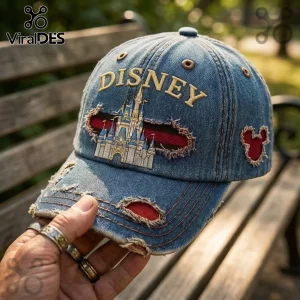 Disney Magic Kingdom Vintage Distressed Denim Cap featuring an embroidered castle, red accents, and frayed fabric edges.
