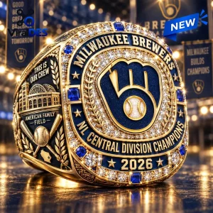 Close-up of a Milwaukee Brewers 2026 Championship Ring featuring team logos, blue accents, and embedded crystals.