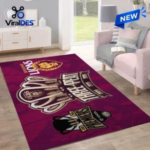 Living room view of a maroon area rug featuring Brisbane Lions 2026 AFL Premiers graphics.