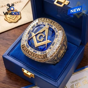 Freemason Square and Compasses ring with blue gemstone, gold accents, and detailed engravings in a blue presentation box.