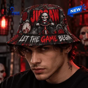 Front view of a Jigsaw Let The Game Begin horror bucket hat worn by a man with dark hair.