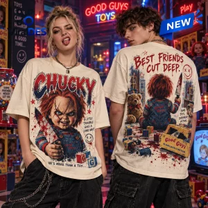 Two people wearing cream colored Chucky Best Friends Cut Deep shirts in a toy store setting.