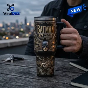 Close-up view of the Batman 87th Anniversary 1939-2026 Stanley Tumbler held outdoors.
