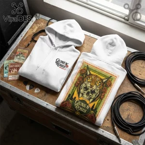 Guns N Roses x The Black Crowes San Diego Tour white hoodie featuring a skull cat graphic and logo on a wooden surface.