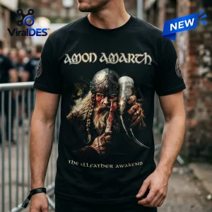 Amon Amarth Allfather Awakens 2026 Concert Tour Shirt featuring a bearded Viking warrior with a bloodied knife and horn.