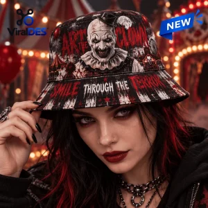 Close-up of a person wearing an Art The Clown Smile Through The Terror Horror Bucket Hat in a carnival setting.