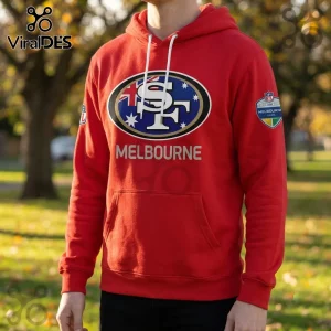 San Francisco 49ers 2026 Melbourne Game red hoodie featuring a team logo, white drawstrings, and an international patch.