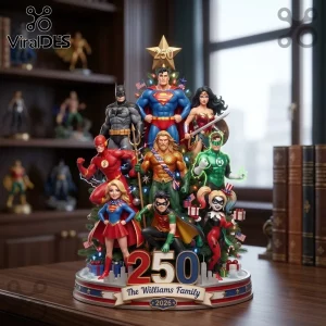 Justice League 2026 Superhero Christmas Tree Ornament featuring Superman, Batman, Wonder Woman, and others on a pedestal base.