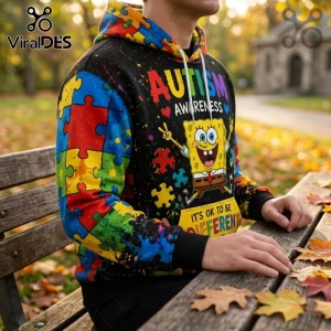 SpongeBob SquarePants Autism Awareness Halloween hoodie featuring colorful puzzle pieces and text on a black background.