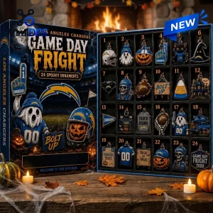 Open Los Angeles Chargers Game Day Fright Halloween Advent Calendar displaying 24 spooky ornaments on a table with candles.