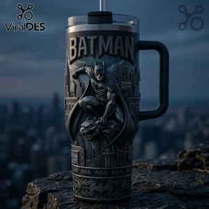 Batman Embossed Stainless Steel Tumbler featuring a sculpted caped crusader crouching on a gargoyle against a city skyline.