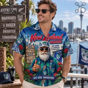 New Zealand Warriors Kia Kaha Hawaiian shirt featuring team logos, Auckland skyline graphics, and floral patterns on blue fabric.