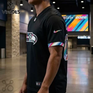 Seattle Seahawks 2026 Crucial Catch black football jersey featuring a multicolored striped logo and sleeve accents.