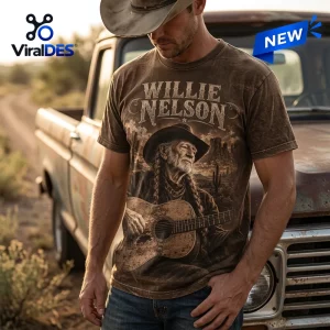 Front view of a brown shirt featuring Willie Nelson with a guitar and desert landscape on the Willie Nelson On The Road t-shirt.