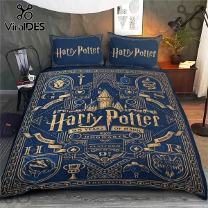 Harry Potter 25th Anniversary Duvet Bedding Set featuring blue fabric, gold Hogwarts icons, and house crests on a bed.