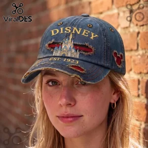 Disney Magic Kingdom Vintage Distressed Denim Cap featuring a castle graphic, Est. 1923 text, and frayed red fabric accents.