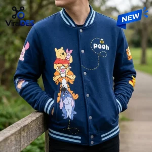 Winnie the Pooh Navy Blue Baseball Jacket featuring a graphic of Pooh, Piglet, Tigger, and Eeyore stacked on the front.